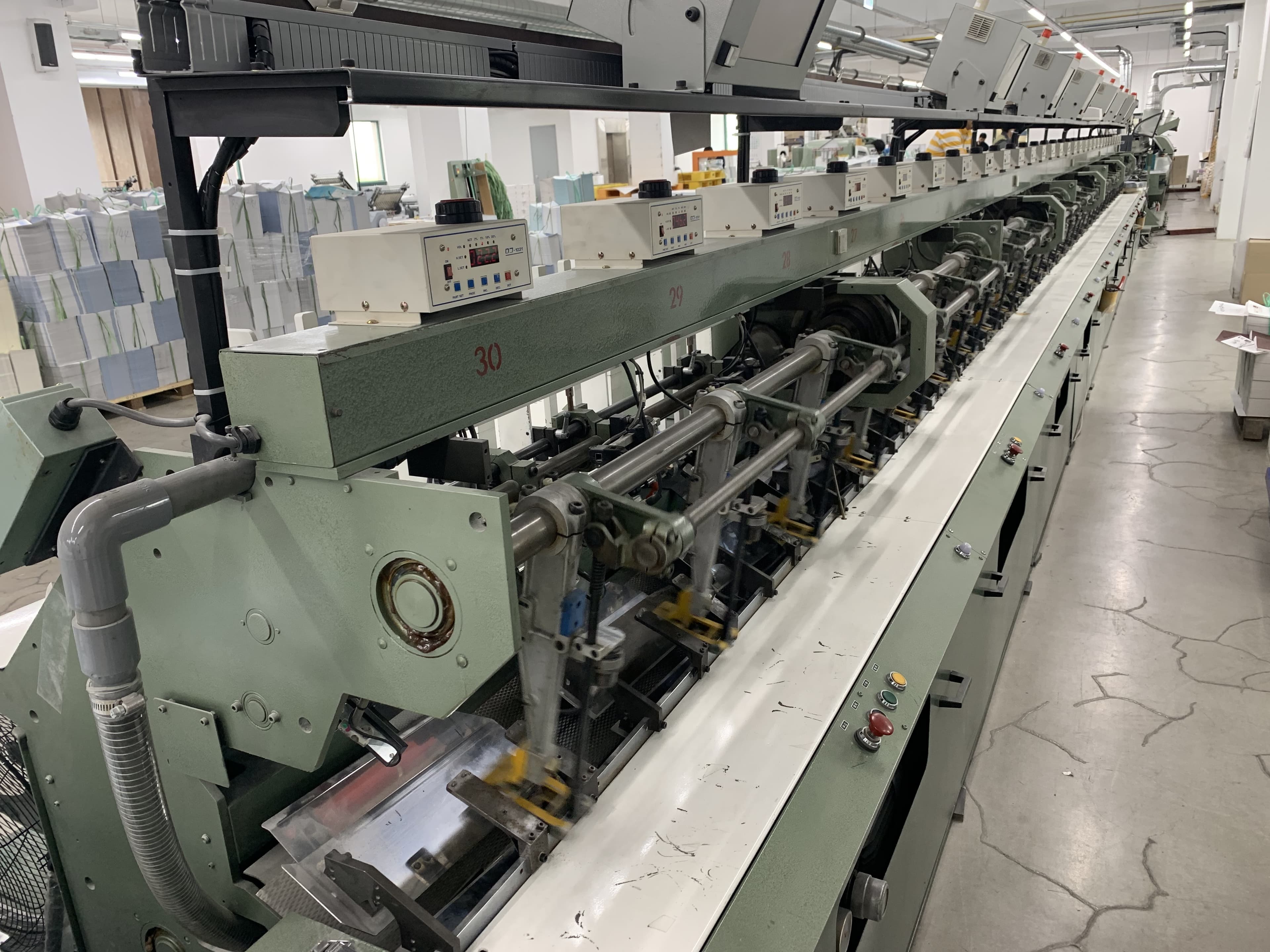 Close-up of the collating and assembly line
