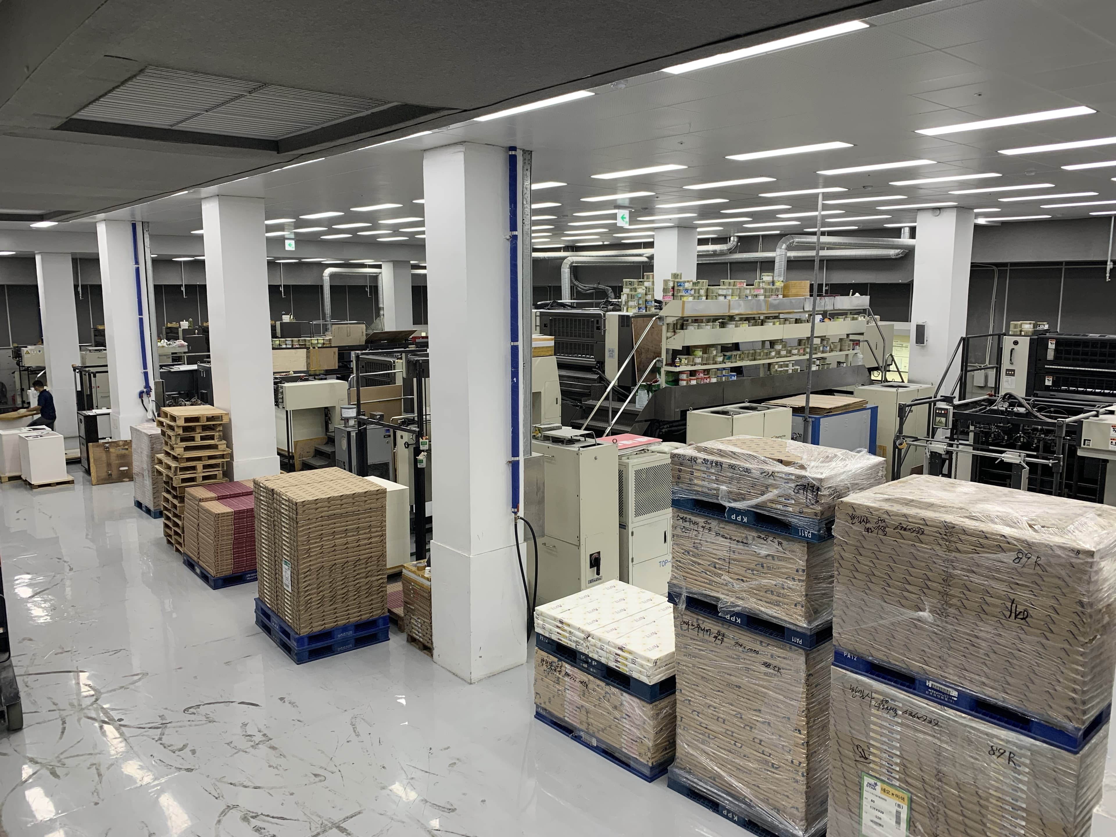 Wide view of the production facility showing scale of the operation